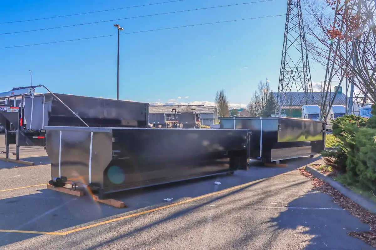 Roll-off dumpster ready for waste disposal at job site for Roofing Dumpster Rental in Fort Lee